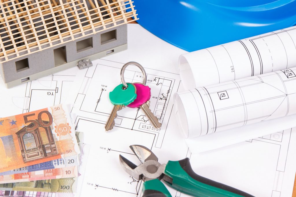 Currencies euro, home keys, electrical diagrams for engineer jobs and house under construction