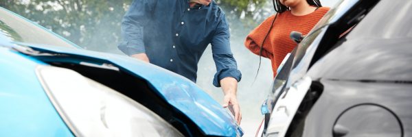 Two Angry Motorists Arguing Over Responsibility For Car Accident